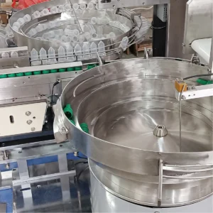 Vibratory Bowl Feeder with an Escapement